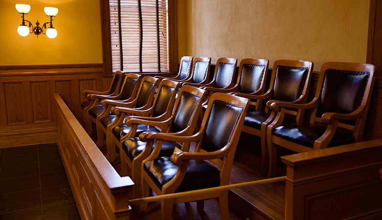 Empty jury box at a county courthouse.