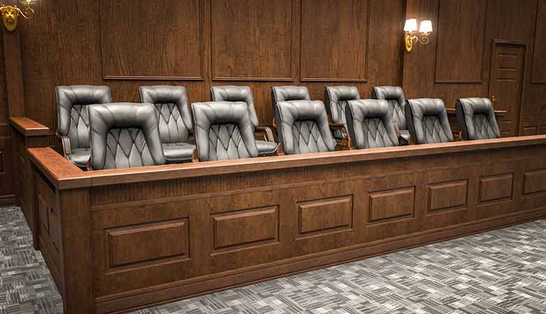 Empty jury bench in court.