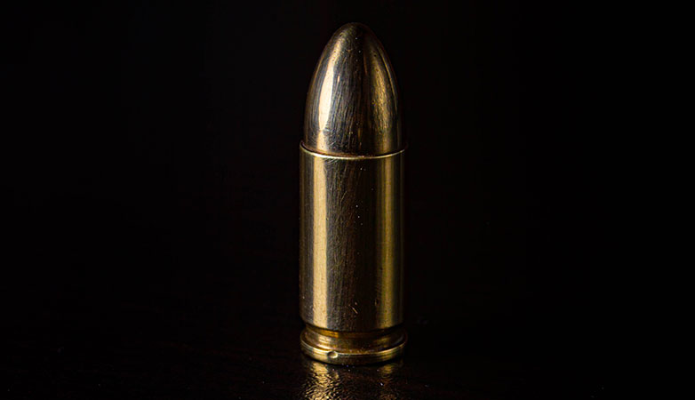 A close up of a bullet.